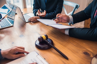 mesothelioma attorneys at a table talking